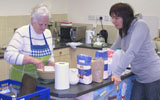 Maisie starting off a batch of flourbread