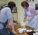 Rubbing margarine into the flour mixture