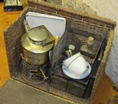 A delightful picnic set, with kettle, primus, matches, meths bottle, tea cups, trays etc - the set is 100% complete and original