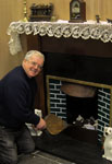 Hugh working up a good glow from the fire