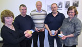 Muriel presents the 'Particulars' with their prizes - turned wooden bowls made by local man, Alastair Hossack, together with a packet of rea