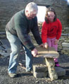 Making the peg hole that was used to secure the slate on the roof