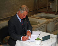 Signing the Visitors Book