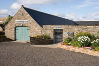 A fine show of colour at the forecourt of Castlehill Heritage Centre. The Flower of Olrig boat featureis to the left of the Visitor Entrance