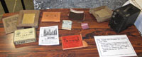 Some photographic artefacts from 1910, including INTONA self toming paper, allowing prints to be produced at home with the minimum of equipment