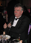 Councillor Ian Ross prepares to announce the winner of the Best Community Initiative category