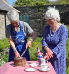 Jayne cuts the celebration Jubilee Cake
