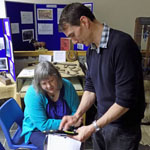 Graeme demonstrates the interactive 3D model of the Bronze Age Roundhouse and project outcomes