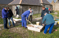Preparing the lime mortar - initial dry mix phase