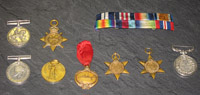 A collection of medals, some of which are contemporary with the sinking of the Titanic