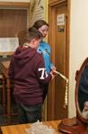 Chloe and Jason cut the ribbon to open the Paul Humphreys Memorial Library
