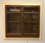 Old bookcase repurposed as an inset display cabinet