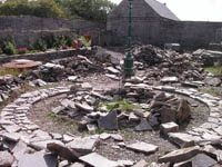The foundation course for the stone circle starts to take shape