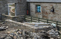 The completed boundary wall around the foreshore /fossil stone feature. This will be partially filled with sand and planted out with vernacular shore