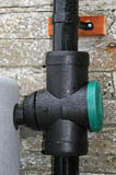 Water from the guttering around the building slate roof is passed through a filter unit which separates out any debris and diverts clean water into th